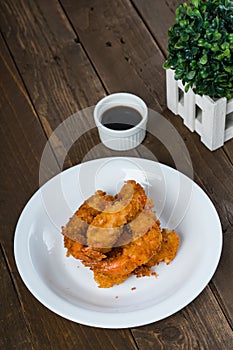 Fried breaded shrimp with tempura sauce