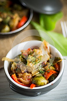 fried brussels sprouts with cauliflower and other vegetables in a bowl