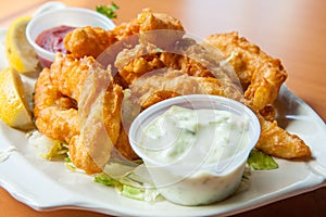 Fried calamari with tartar sauce photo