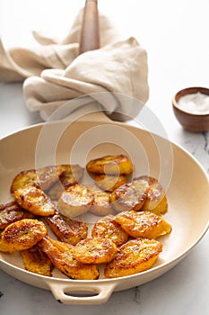 Fried caramelized plantains in a pan