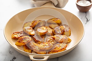 Fried caramelized plantains in a pan
