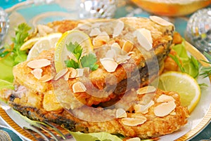 Fried carp with almonds for christmas