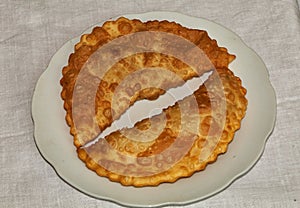 Fried chebureks on small plate