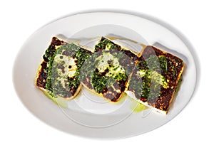 Fried cheese on a plate over white background