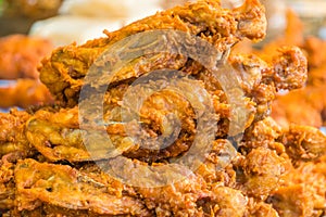 Fried chicken basket in golden light