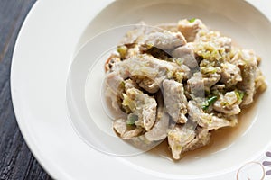 fried Chicken,chilli,Celery/A plate placed on a round wooden ta