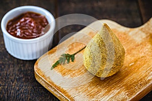 fried chicken coxinha typical of brazil. Salty served with ketchup, in cafeterias, bakeries or restaurants. Traditional snack from