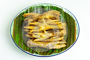 Fried chicken feet (Indonesian called ceker or cakar) with white background