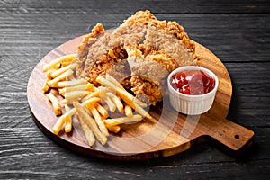 fried chicken with french fries and nuggets meal