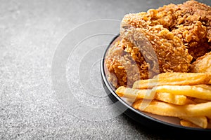 fried chicken with french fries and nuggets meal