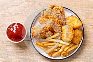 fried chicken with french fries and nuggets meal