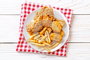 fried chicken with french fries and nuggets meal