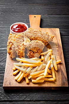 fried chicken with french fries and nuggets meal