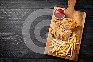 fried chicken with french fries and nuggets meal