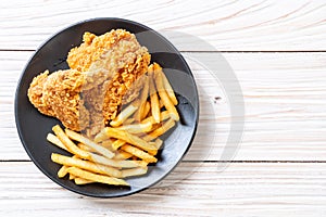 fried chicken with french fries and nuggets meal