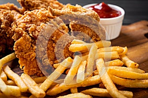 fried chicken with french fries and nuggets meal