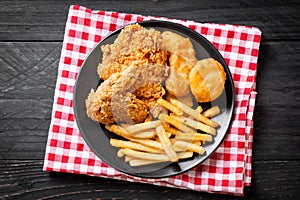 fried chicken with french fries and nuggets meal