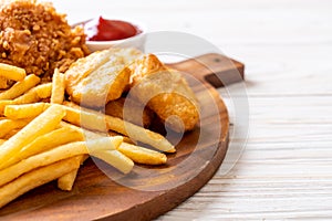 fried chicken with french fries and nuggets meal