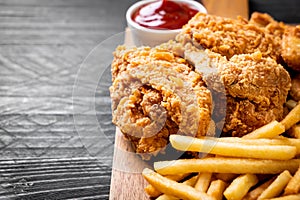 fried chicken with french fries and nuggets meal