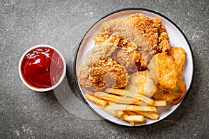 fried chicken with french fries and nuggets meal