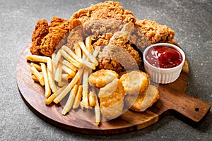 fried chicken with french fries and nuggets meal