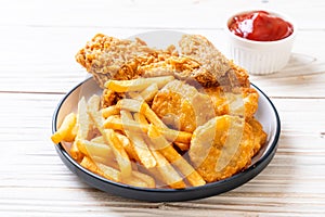 fried chicken with french fries and nuggets meal