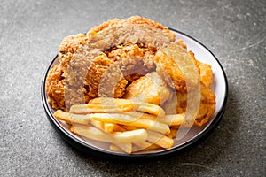 fried chicken with french fries and nuggets meal