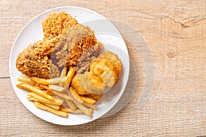 fried chicken with french fries and nuggets meal