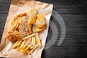 fried chicken with french fries and nuggets meal