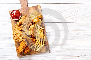 fried chicken with french fries and nuggets meal