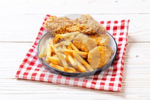 fried chicken with french fries and nuggets meal