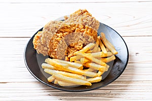 fried chicken with french fries and nuggets meal