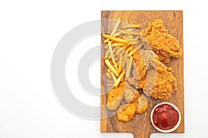 fried chicken with french fries and nuggets meal (junk food and unhealthy food