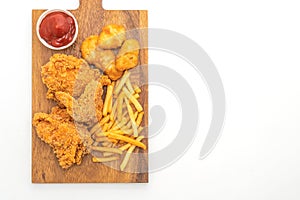 fried chicken with french fries and nuggets meal (junk food and unhealthy food