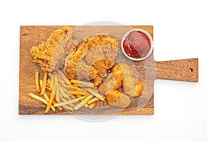 fried chicken with french fries and nuggets meal (junk food and unhealthy food