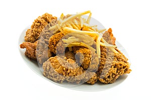 Fried chicken and french fries in white plate