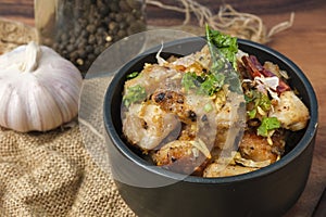 Fried chicken with garlic and pepper with rice. Thai Dish