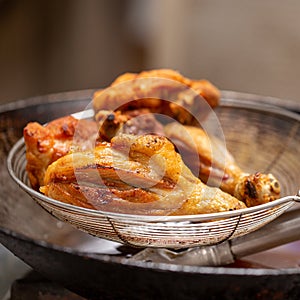 Fried chicken in hot oil and boiling in pan