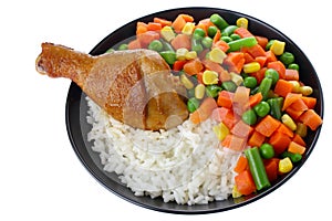 Fried chicken leg with rice and vegetables