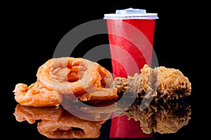 Fried Chicken, Onion Ring and soft drink in Fast Food