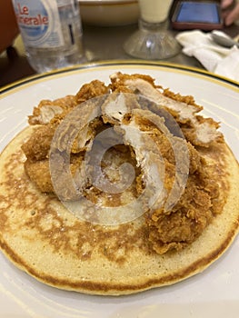 Fried chicken with pancake and maple syrup