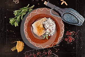 Fried chicken and rice in a plate top view