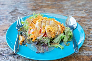 Fried chicken salad on green clean and healthly diet food.