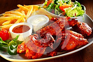 Fried Chicken with Sauce, Fries and Veggies