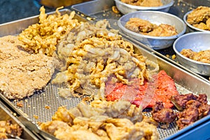 Fried chicken and squid at traditional market in Taiwan