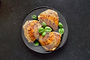 Fried chicken thighs in plate