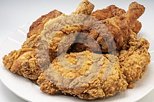 Fried chicken in white plate isolated on white background, Fried chicken on white With clipping path.