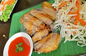 Fried Chicken Wings with Chili Sauce. Thai food