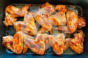 Fried chicken wings in grill