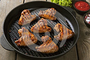 Fried chicken wings grill on grill pan